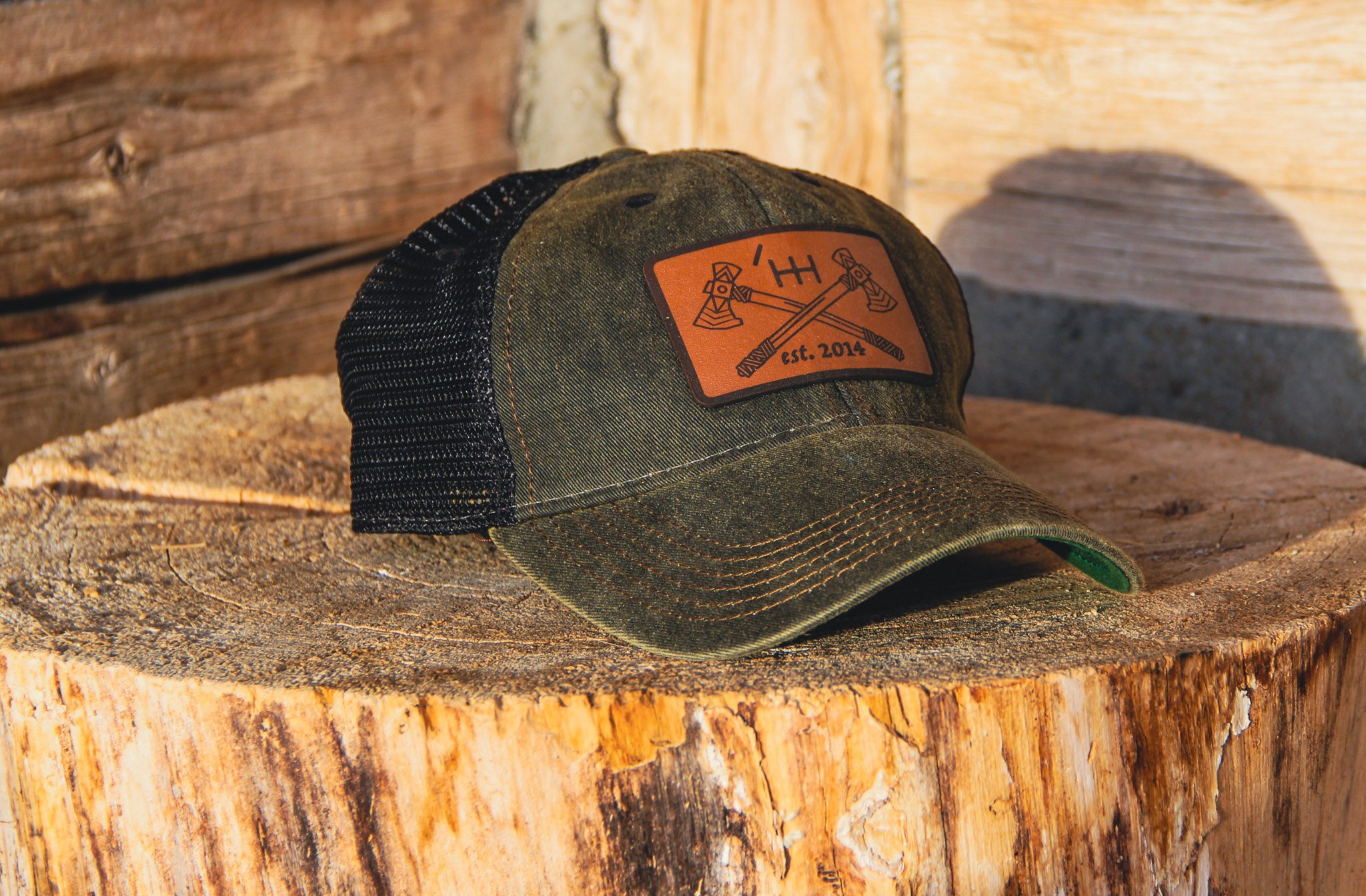 Washed Black Tomahawks Leather Patch Trucker Hat